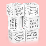 A stack of six 4 pack boxes of Good Shit apple pre + probiotic soda